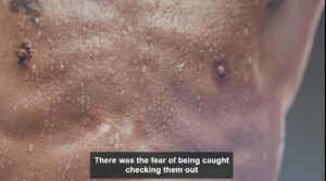 His Sweat - a male torso with beads of sweat on it